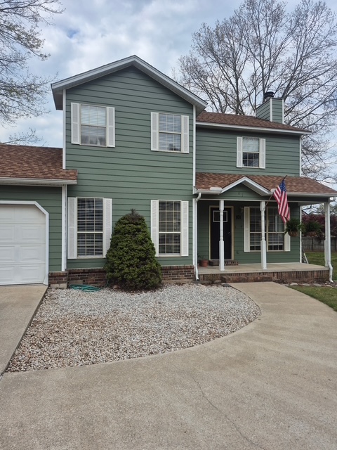 Freshly painted two-story home by Two Bros Paint Pros