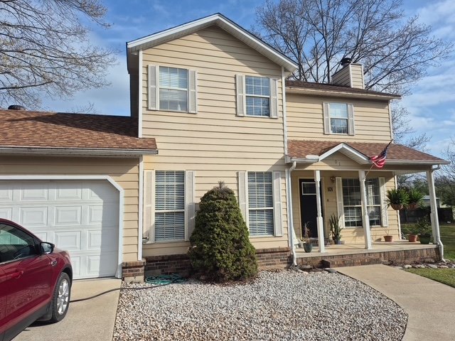 Two-story home exterior repaint